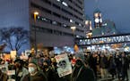 Demonstrators march in downtown Minneapolis on Feb. 8 protesting the killing of Amir Locke.