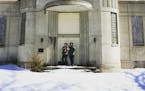 Kaycee and Mark Kramer outside their new home, an old Art Deco two-room schoolhouse in Norcross that’s been abandoned since the 1970s.