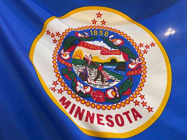The Minnesota state flag is seen as displayed in the State Capitol rotunda on March 24, 2022.
