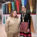 L-R) Pao Houa Her and Dyani White Hawk pose for a photo in front of Dyani White Hawk’s work at the Whitney Museum of Art during its Biennial in New 