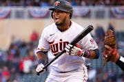 Twins pinch hitter Luis Arraez reacted to an umpire’s call before hitting a single in the ninth inning against the Mariners on Friday.