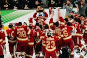 Denver captain Cole Guttman lifted the championship trophy after the Pioneers beat Minnesota State Mankato on Saturday night in Boston.