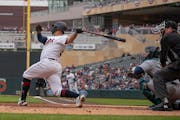 Minnesota Twins catcher Gary Sanchez (24) hit a grand slam in the first inning against the Mariners.