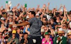 Scottie Scheffler celebrated after winning the 86th Masters golf tournament on Sunday.
