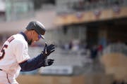 The Twins’ Byron Buxton celebrated after belting his second home run of the game in a 10-4 victory over the Mariners at Target Field on Sunday. Buxt