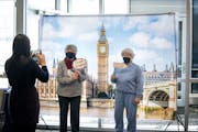 Ildi Sundheim and Sharon Brown posed for a photo in front of a Big Ben mural put up by Delta Air Lines as it restarted direct flights between Minneapo