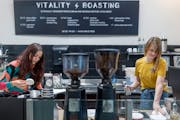 Vitality Roasting’s Amanda Pardi, left, and Keli Gilbertson, VP of operations, work the morning coffee rush in Minneapolis, Minn., on Friday, April 