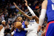 Guard Paul George (shown working against Wolves forward Jaden McDaniels in a November 2021 game) is the Clippers’ leading scorer at 24.3 points per 