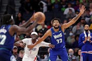 The Timberwolves have had to learn how best to get the ball to center Karl-Anthony Towns (32) against the Clippers, who often guard him with a smaller