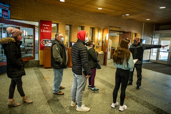 Admissions counselor John Brown gave a campus tour in St. Cloud, Minn., in March. Declining enrollment could bode ill for colleges like St. Cloud Stat