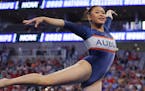 Auburn’s Suni Lee competes in the floor exercise during the NCAA women’s gymnastics championships Saturday in Fort Worth, Texas.