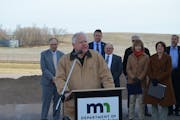 Gov. Tim Walz spoke about Hwy 14.’s crash-prone reputation Tuesday at a groundbreaking ceremony in Courtland, Minn., for a project to expand the las