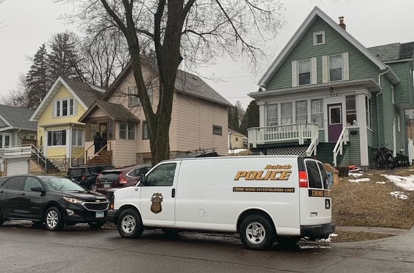 Five people were found dead inside a Duluth home, at right, on Wednesday after police received a report of a male experiencing a mental health crisis,
