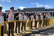 Delta Air Lines pilots, who are negotiating a new contract with the airline, demonstrated at Minneapolis-St. Paul International Airport Thursday sayin