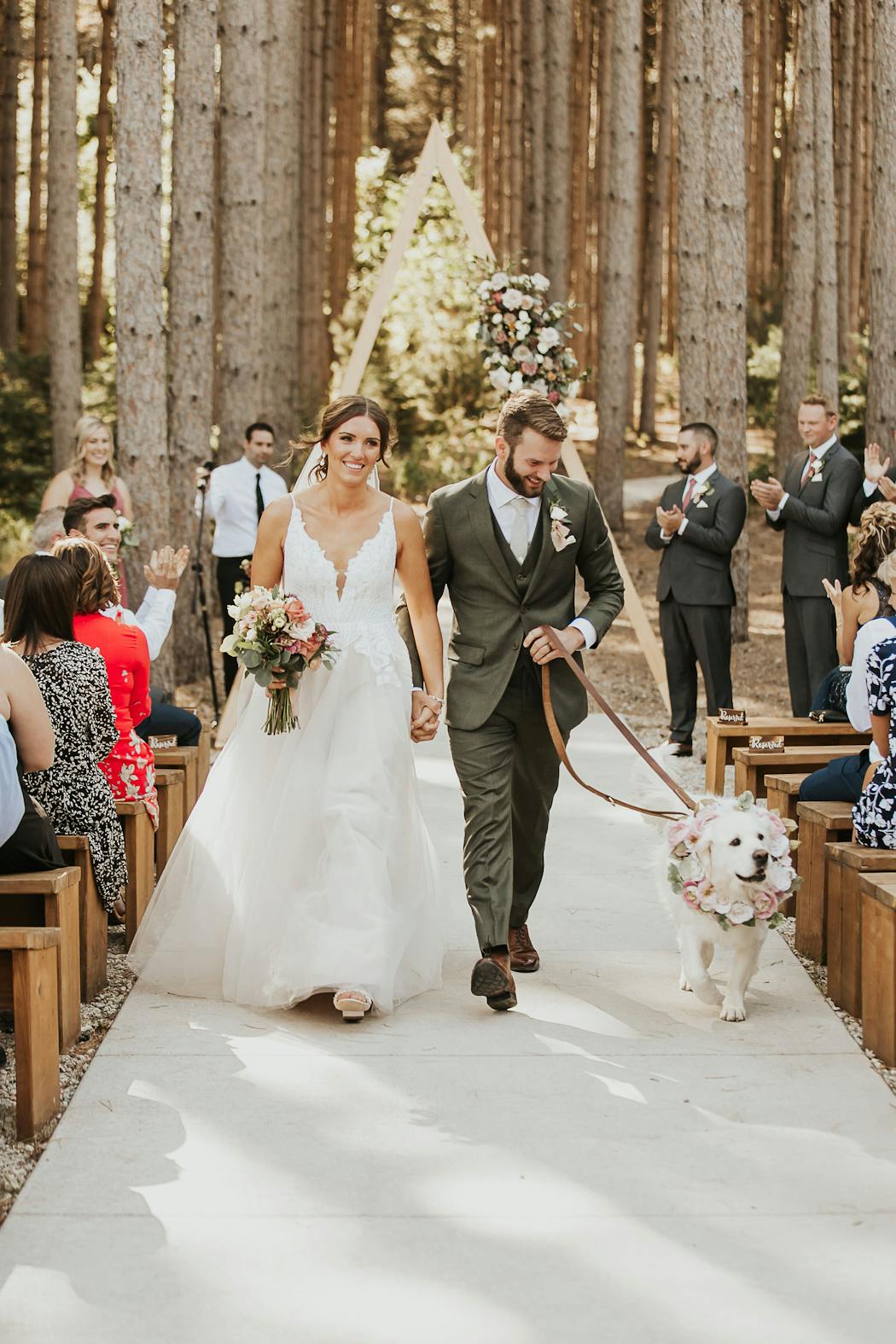 Your dog can be a guest at your wedding if you hire a wedding pet attendant. 