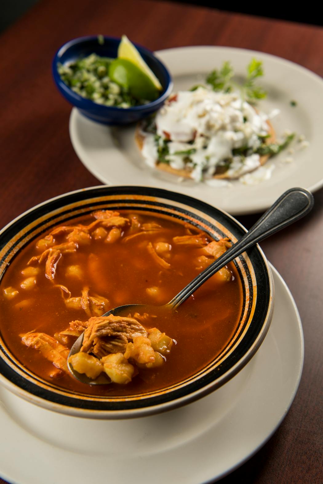 The Pozole de Pollo at Salsa a la Salsa comes with a variety of toppings.