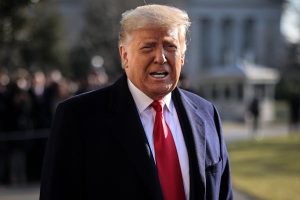 Then-President Donald Trump spoke to reporters outside the White House on Jan. 12, 2021. A number of boxes of material made their way from the West Wi