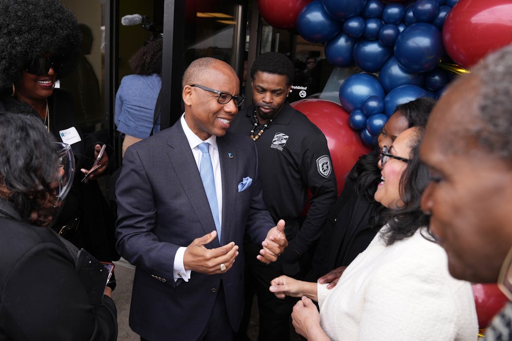 Kenneth Kelly, chief executive of First Independence Bank the region’s first Black-owned bank, talked with Stephanie Burrage, Deputy Commissioner at Minnesota Department of Education, at its grand opening Tuesday.