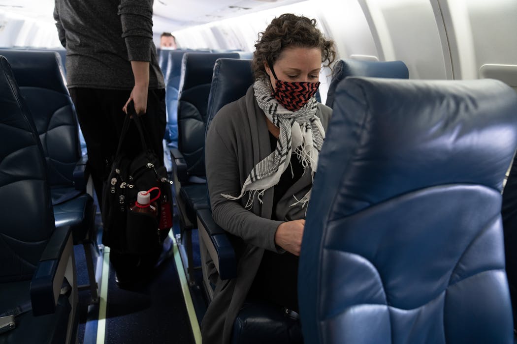Dr. Sarah Traxler boards a plane to Minneapolis from Sioux Falls after a day of meeting with patients on her monthly rotation at the only Planned Parenthood in South Dakota.