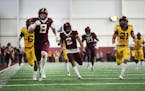 Thomas Rush (8) returned an interception for a touchdown during the 2019 Gophers spring game, which was moved indoors because of weather concerns.