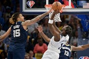 Wolves guard Anthony Edwards shot against Grizzlies forward Brandon Clarke during Game 5 Tuesday. Edwards said he needs to drive and create more late 