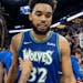 Ja Morant (12) of the Memphis Grizzlies and Karl Anthony-Towns (32) of the Minnesota Timberwolves greet each other at the end of game 6 of the playoff