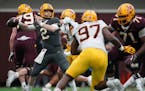 Gophers quarterback Tanner Morgan looked to make a long pass during the annual Spring Game Saturday in the team’s indoor football facility 