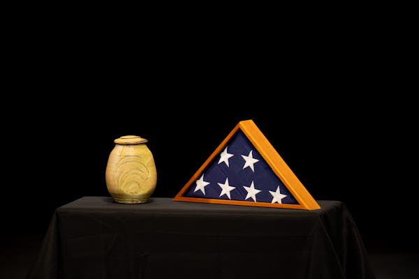 An urn containing the ashes of Vice President Walter Mondale were placed on the stage before his memorial service.
