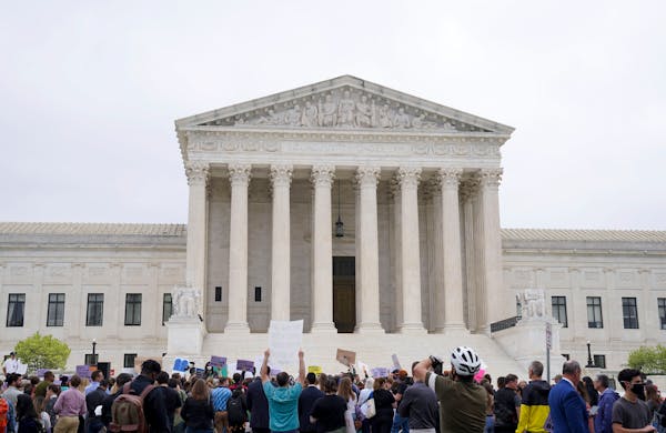 Demonstrators protest outside the Supreme Court in May after a draft opinion was leaked that overturns Roe v. Wade.