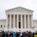 Demonstrators protest outside the Supreme Court after a draft opinion was leaked that overturns Roe v. Wade.