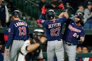 The Twins’ Ryan Jeffers is greeted near home plate by Gary Sanchez after Jeffers scored Sanchez, Trevor Larnach and himself on three-run home run ag