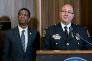St. Paul Police Deputy Chief Jeremy Ellison, right, addressed the media Wednesday after he was introduced by Mayor Melvin Carter as interim chief of t