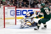 Kirill Kaprizov (97) of the Minnesota Wild gets the puck past St. Louis Blues goalie Ville Husso for a goal in the third period Tuesday, May 4, at Xce