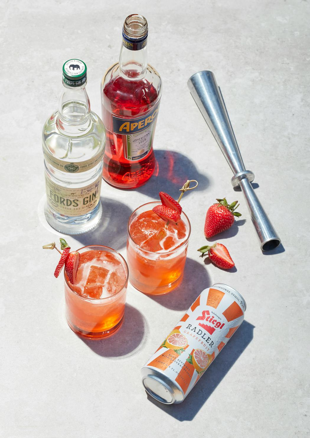 Two summer favorites — strawberries and grapefruit radlers — join forces for a spritzy refresher.