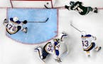 Wild center Joel Eriksson Ek stuffed the puck past Blues goalie Ville Husso in the second period of Game 2 on Wednesday. Eriksson Ek reached career hi
