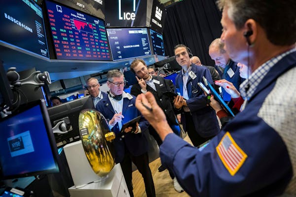 Traders at the New York Stock Exchange Friday.