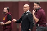 Gophers coach PJ Fleck, middle, watched the team’s annual spring game on April 30.