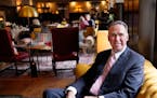 Joe Puishys, chairman of the Minneapolis Club board, sits in the downtown club’s dining room.