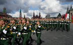 Russian servicemen march in the Victory Day military parade in Moscow on May 9, marking the 77th anniversary of the end of World War II.
