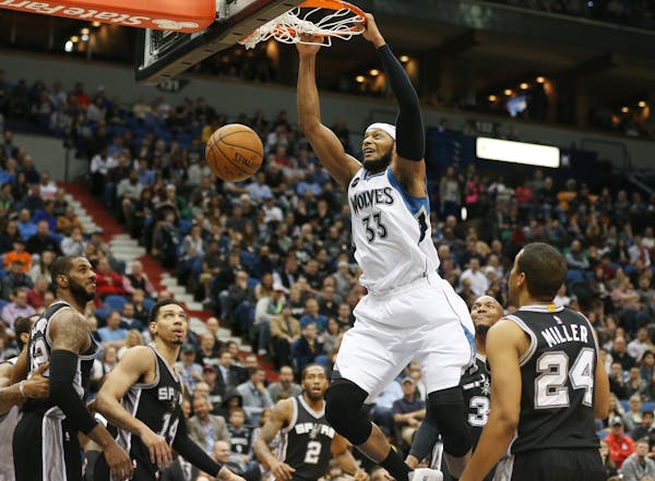 Timberwolves forward Adreian Payne dunked against the Spurs at Target Center during a game in March, 2016.  