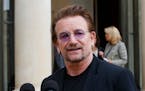 U2 singer Bono speaks to the media after a meeting at the Elysee Palace in Paris in 2017. Bono’s memoir “Surrender” is planned for release on No