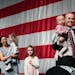 GOP attorney general candidate Jim Schultz left the stage with his wife, Molly, and their children, Friday at the Minnesota State Republican Conventio