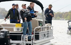 Gov. Tim Walz is shown at the 2019 Governor’s Fishing Opener in Albert Lea, Minn. On Saturday, Walz was back in a fishing boat, on Lake Winnibigoshi