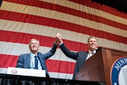 GOP candidate for governor Scott Jensen toot the stage with running mate Matt Birk Saturday at the Republican State Convention in Rochester.