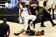 Los Angeles Clippers guard Patrick Beverley (21) smiles after fouling Phoenix Suns guard Chris Paul in the 2021 playoffs. Beverley was called for a fl