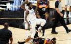 Los Angeles Clippers guard Patrick Beverley (21) smiles after fouling Phoenix Suns guard Chris Paul in the 2021 playoffs. Beverley was called for a fl