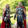 Thor (Chris Hemsworth) with his ex-girlfriend Jane Foster (Natalie Portman), who takes up the mantle of Mighty Thor, in “Thor: Love and Thunder.”