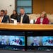 Daron Korte, assistant commissioner of the Minnesota Department of Education, center, shown in April. Others seated with Korte were, from left, Eric T