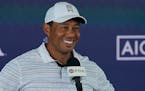 Tiger Woods speaks during a news conference at the PGA Championship