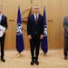 Finland’s Ambassador to NATO Klaus Korhonen, left, NATO Secretary-General Jens Stoltenberg and Sweden’s Ambassador to NATO Axel Wernhoff attend a 